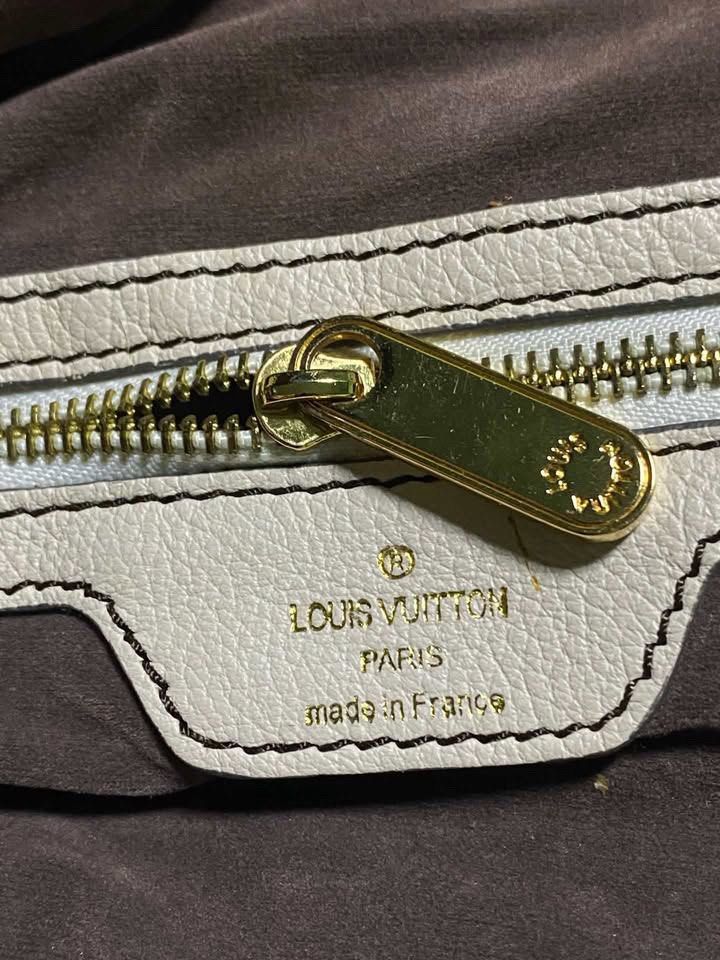 Louis Vuitton Monogram Mahina Leather Bag (Category: Luxury Bags & Wallets) located in Las Pinas. Submitted by wayne_heats (Listing ID 1467793655, Image 2). Description: measurement LENGTH: 19.5 WIDTH: 11.5 condition: good-excellent flaws | issues: need cleaning only.