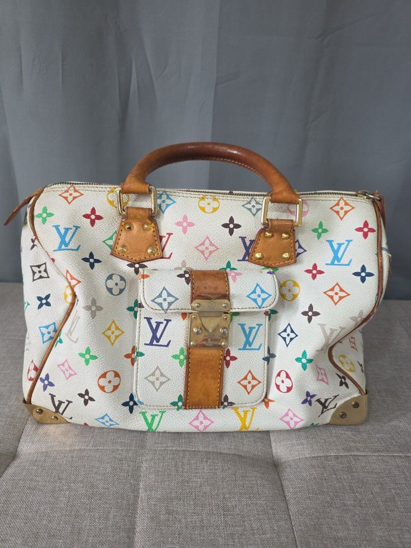 Louis Vuitton Monogram Multicolored Speedy (Category: Luxury Bags & Wallets) located in Binan City. Submitted by karosellescloset (Listing ID 1467663390, Image 1). Description: Louis Vuitton Monogram Multicolore Speedy 30 in White. ​Key features of this model include: ​ ​Material: White coated canvas featuring 33 distinct colors in the LV monogram pattern, with natural cowhide leather (vachetta) trim and top handles. ​Hardware: Gold-tone hardware
