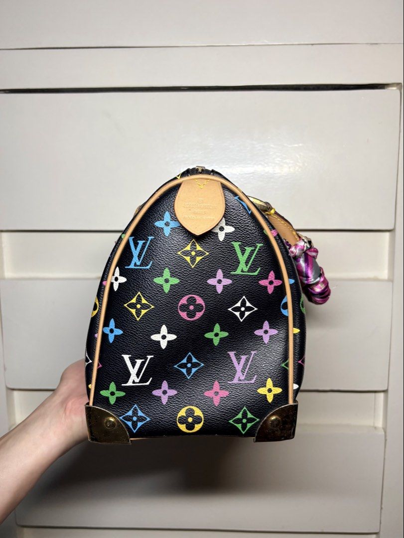 Louis Vuitton Monogram Multicolore Speedy 30 (Noir / Black) (Category: Purses & Pouches) located in Paranaque City. Submitted by honeykkkk (Listing ID 1467698290, Image 2). Description: • Details: - Authentic Takashi Murakami collaboration piece featuring iconic 33-color Monogram print on black coated canvas. - Trimmed in natural Vachetta leather with brass corner protectors and an exterior S-lock front flap pocket lined in deep red alcantara. - 