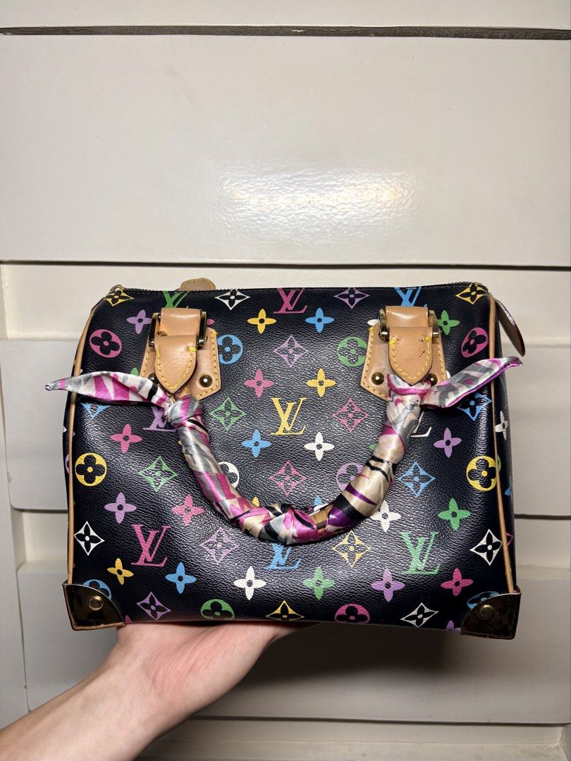 Louis Vuitton Monogram Multicolore Speedy 30 (Noir / Black) (Category: Purses & Pouches) located in Paranaque City. Submitted by honeykkkk (Listing ID 1467698290, Image 3). Description: • Details: - Authentic Takashi Murakami collaboration piece featuring iconic 33-color Monogram print on black coated canvas. - Trimmed in natural Vachetta leather with brass corner protectors and an exterior S-lock front flap pocket lined in deep red alcantara. - 