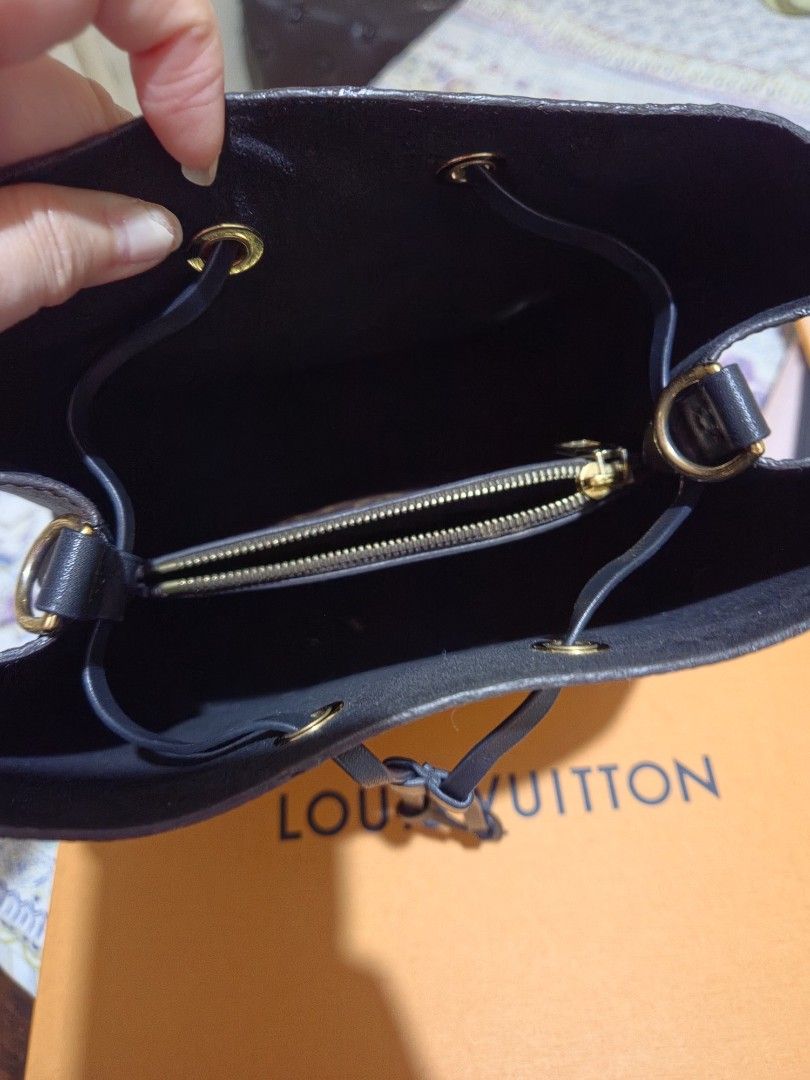 Louis Vuitton Monogram NeoNoe Bucket Bag (Category: Luxury Bags & Wallets) located in Las Pinas. Submitted by swiftdragon_0c099a (Listing ID 1467740162, Image 3). Description: - Authentic Louis Vuitton Monogram NeoNoe bucket bag in dark brown canvas - Secure drawstring closure with luxurious gold-tone hardware - Versatile design with a removable black leather strap - Well-organized interior featuring a central zippered pouch and two main compartm