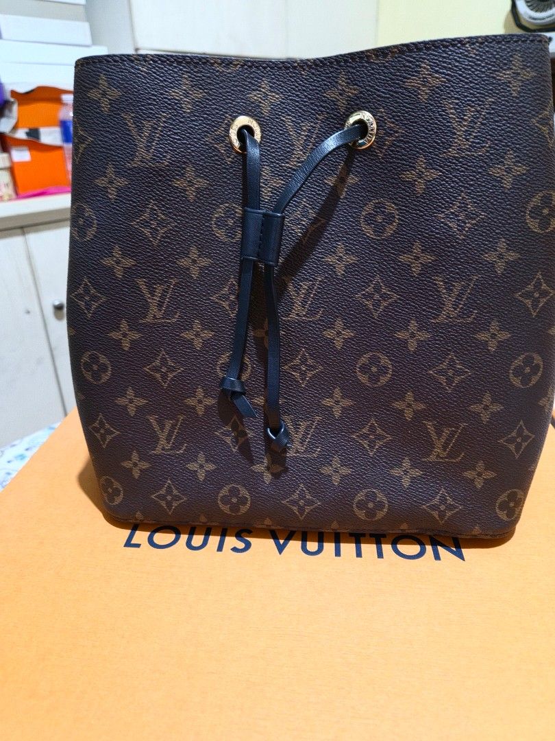 Louis Vuitton Monogram NeoNoe Bucket Bag (Category: Luxury Bags & Wallets) located in Las Pinas. Submitted by swiftdragon_0c099a (Listing ID 1467740162, Image 2). Description: - Authentic Louis Vuitton Monogram NeoNoe bucket bag in dark brown canvas - Secure drawstring closure with luxurious gold-tone hardware - Versatile design with a removable black leather strap - Well-organized interior featuring a central zippered pouch and two main compartm