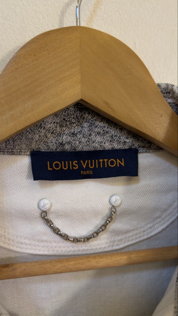 Louis Vuitton Monogram Spray Denim Jacket (Category: Coats, Jackets and Outerwear) located in Paranaque City. Submitted by mykapoynton (Listing ID 1467807799, Image 3). Description: Louis Vuitton Monogram Spray Denim Jacket - Size: S - Material: 100% Cotton (Made in Italy) - Design: Gradient grey and white spray effect with all-over classic monogram pattern - Details: Metal chain inside the collar, LV engraved buttons, and single chest pocket wit