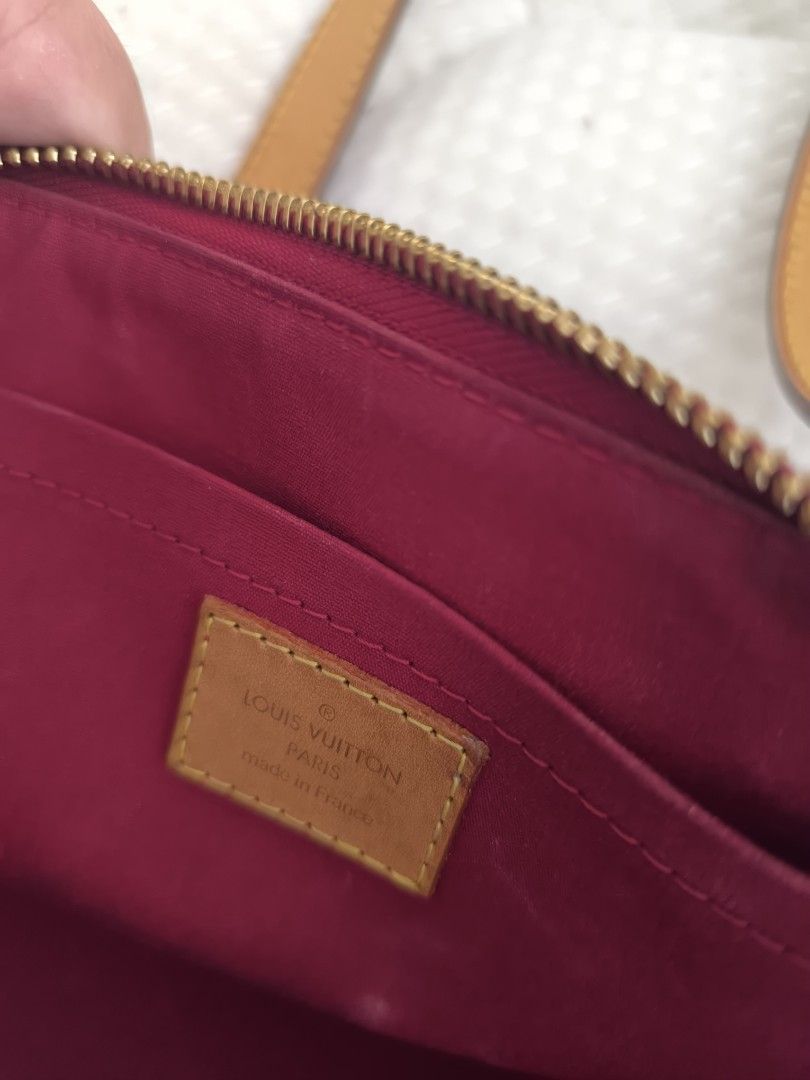 Louis Vuitton Monogram Vernis Fowler Red Handbag (Category: Luxury Bags & Wallets) located in Paranaque City. Submitted by ilovejapao97230 (Listing ID 1467716046, Image 3). Description: Louis Vuitton Fowler shoulder bag in red Monogram Vernis leather. Vachetta leather straps with adjustable gold buckles. Top zip closure opens to a dark pink textile lining with an internal slip pocket. Made in France. Exterior patent leather and handles show minor