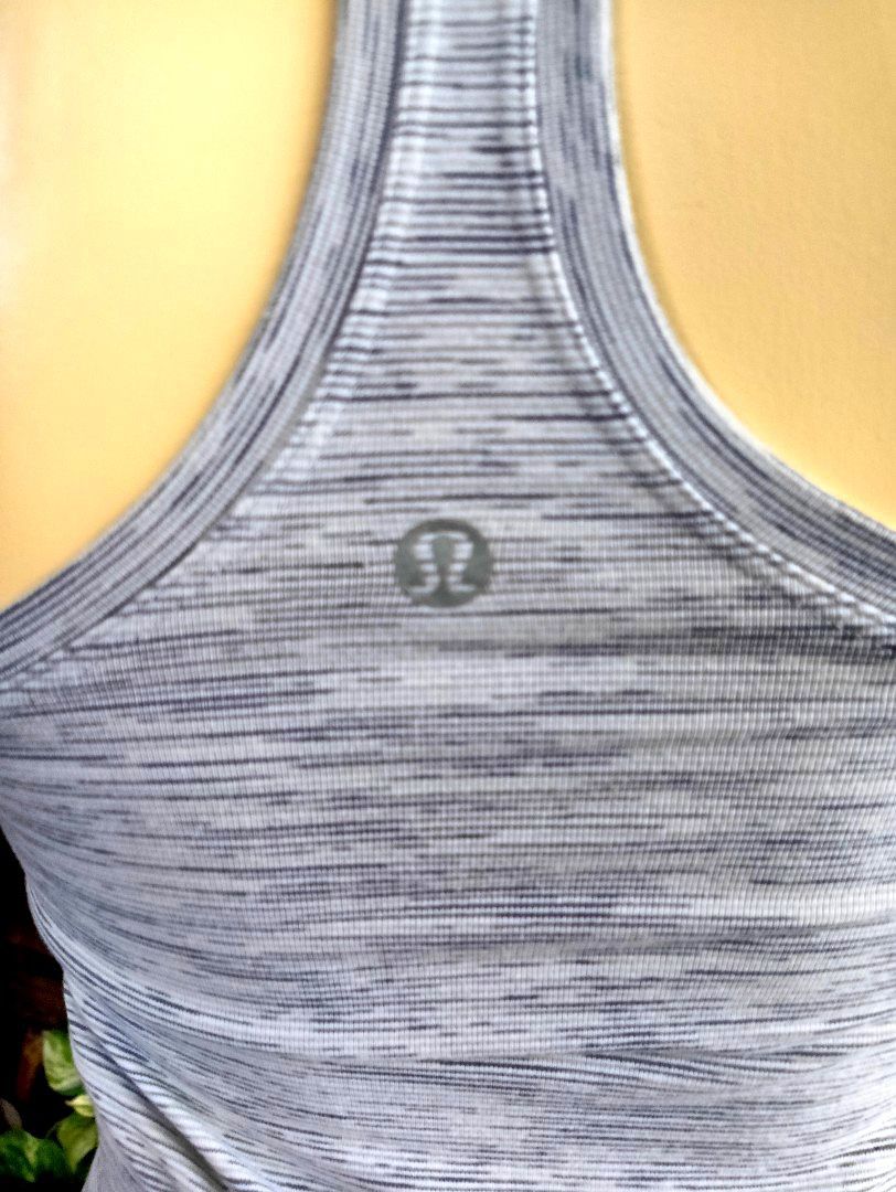 Lululemon (Category: Activewear) located in Rizal. Submitted by timeless_shop (Listing ID 1467661504, Image 3). Description: ORIGINAL Lululemon Cool Racerback Tank - Heathered Light Gray -6 📏 Length: 25 inches 📏 Width : 13 inches Bust Fit 32-34 👚 Size: 6 🎨 Color: Heathered Light Gray / White - rare colorway! ✂️ Cut: Racerback - sexy sa likod, free movement 💯 Condition: 9.9/10 🎨 Color Rate: 9.9/10 - Maayos at malinis din 🧵 Quality ng Fabric