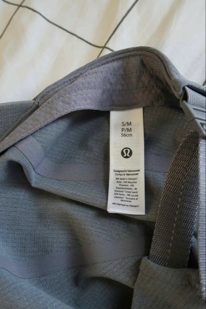 Lululemon Cap Size S/M Grey (Category: Caps & Hats) located in Manila. Submitted by gentlewind_62f064 (Listing ID 1467676105, Image 2). Description: - Brand: Lululemon - Color: Grey - Size: S/M - Material: Unique grid texture throughout - Closure: Adjustable strap with buckle - Comfort: Built-in interior sweatband - Details: Subtle printed Lululemon omega logo on the lower left panel - Condition: Excellent / Like new - Meet-ups or shipping availa