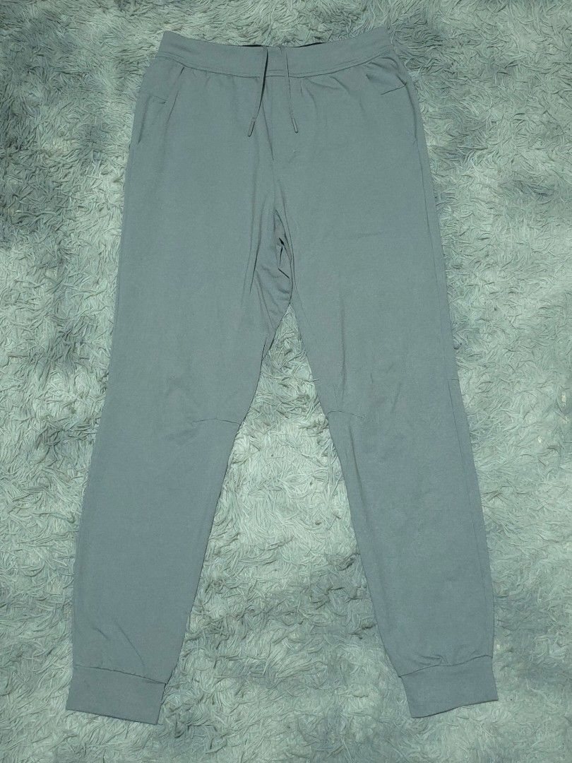 Lululemon Grey Casual Jogger Pants with Drawstring (Category: Joggers) located in Abulug. Submitted by humanwhosellthings (Listing ID 1467638261, Image 1). Description: - LÙLU🍋 Jogger Pants ✅Excellent Condition ✅Issue: none ▫️Waist Size: 28-36 ▫️Length: 40 - Fit: Comfortable with cuffed ankles - Waistband: Elastic with matching drawstring - Pockets: Deep side pockets - Best for: Lounging or running errands - Quality: Clean stitching throughout.