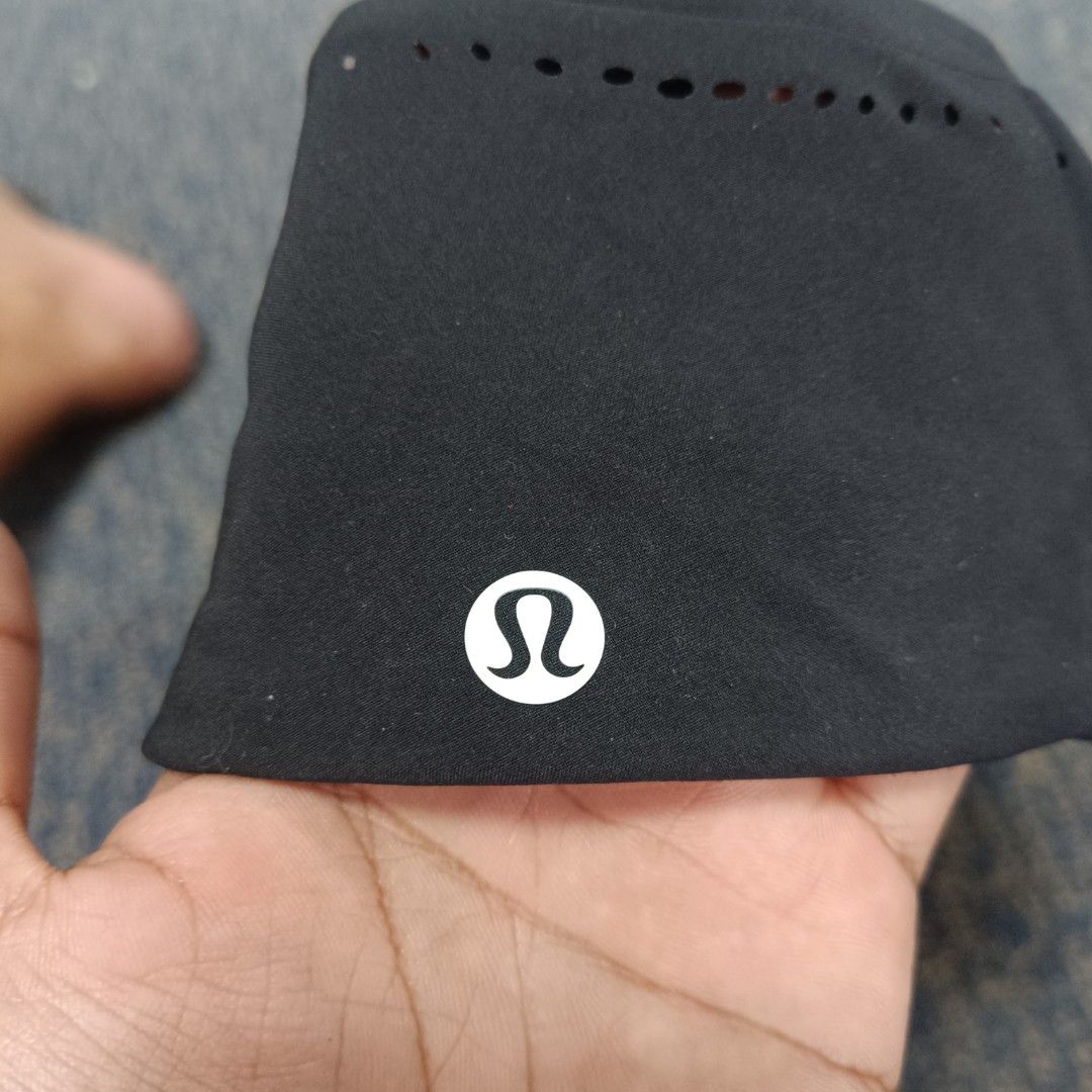 Lululemon Team Canada Olympic Cap Hat Black (Category: Caps & Hats) located in Angeles City. Submitted by thriftilious.ph (Listing ID 1467647637, Image 3). Description: - Authentic Lululemon Team Canada cap in classic black - Features bold "CAN" lettering on the front - Side panels equipped with laser-cut ventilation perforations for breathability - Iconic Lululemon omega logo on one side and Team Canada maple leaf with Olympic rings on the other
