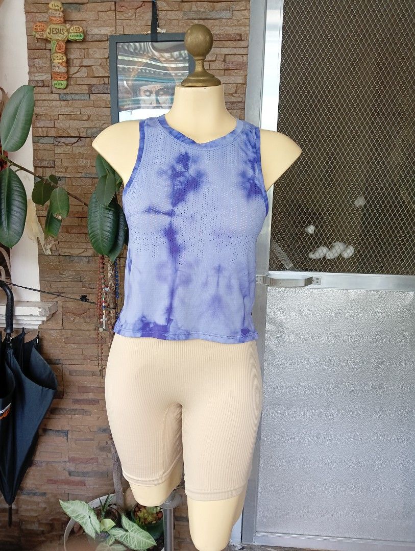Lululemon Trained to be Tank Top (Category: Activewear) located in Rizal. Submitted by timeless_shop (Listing ID 1467657409, Image 2). Description: Original Lululemon Trained to Be Tank Size 6 📏 Size: Dot 6 (Best fit S-M) Bust Size 32-34 📝 Details: - Length: 19 inches - Width: 16 inches flat laid - Fabric: Breathable, light & quick-dry - Design: Tie dye pattern + side slit - Style: Relaxed fit, nice color too Condition: 9.9/10 - Like New Almost