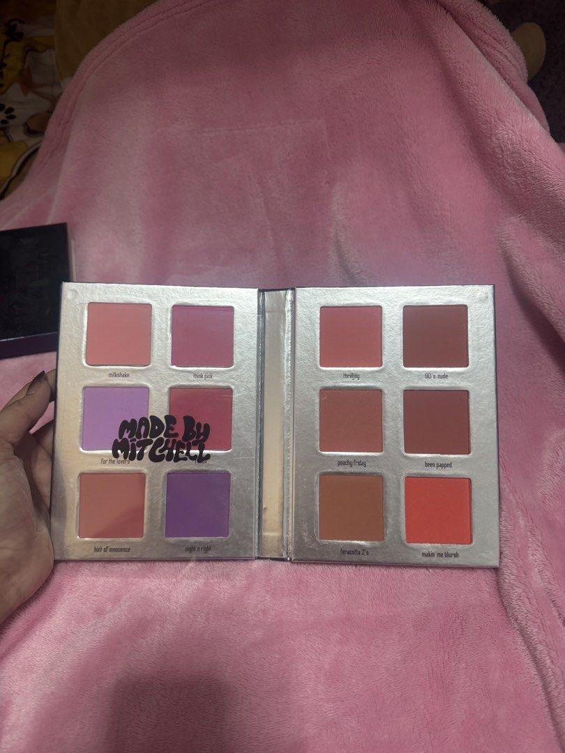 Made By Mitchell Blurtish Blusher Palette (Category: Makeup) located in Arayat. Submitted by janeng_ba10fd (Listing ID 1467754328, Image 2). Description: - Brand: Made By Mitchell Blursh Palette - Shades: 12 vibrant shades (pinks, purples, terracottas, nudes including milkshake, think pink, thrilljoy, 90's nude, etc.) - Packaging: Silver booklet-style palette with original retro disco outer box - Finish: Multi-finish powder blushes - Condition: G