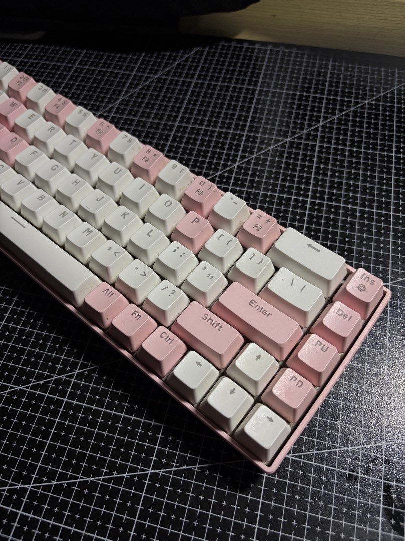 MageGee MK-Box 68-Key Pink Mechanical Keyboard (Category: Computer Keyboard) located in Manila. Submitted by thriftilaok (Listing ID 1467727400, Image 3). Description: - Model: MageGee MK-Box Mechanical Keyboard - Colorway: Cute Dual-Tone Pink and White - Layout: Compact 68-key with dedicated arrow keys and navigation cluster - Switches: Clicky Blue mechanical switches - Connectivity: Wired USB - Condition: Fully functional, adjustable feet intac