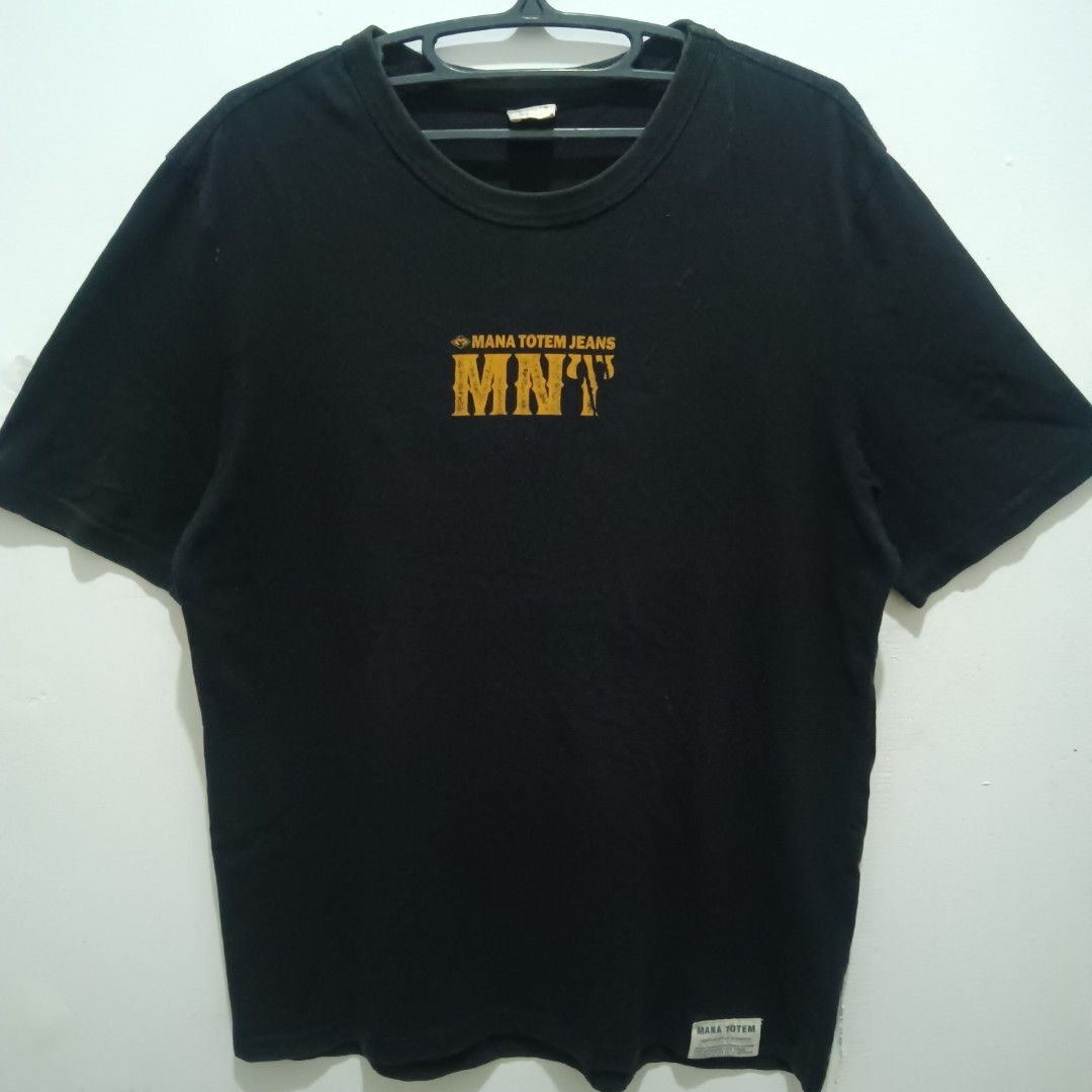 MANA TOTEM Shirt (Category: Tshirts & Polo Shirts ) located in Caloocan City. Submitted by jaychingsss (Listing ID 1467750788, Image 2). Description: Mana Totem Shirt - 100 22x28 Complete Tags Color Rate: 9/10 No issue NEED WASH.