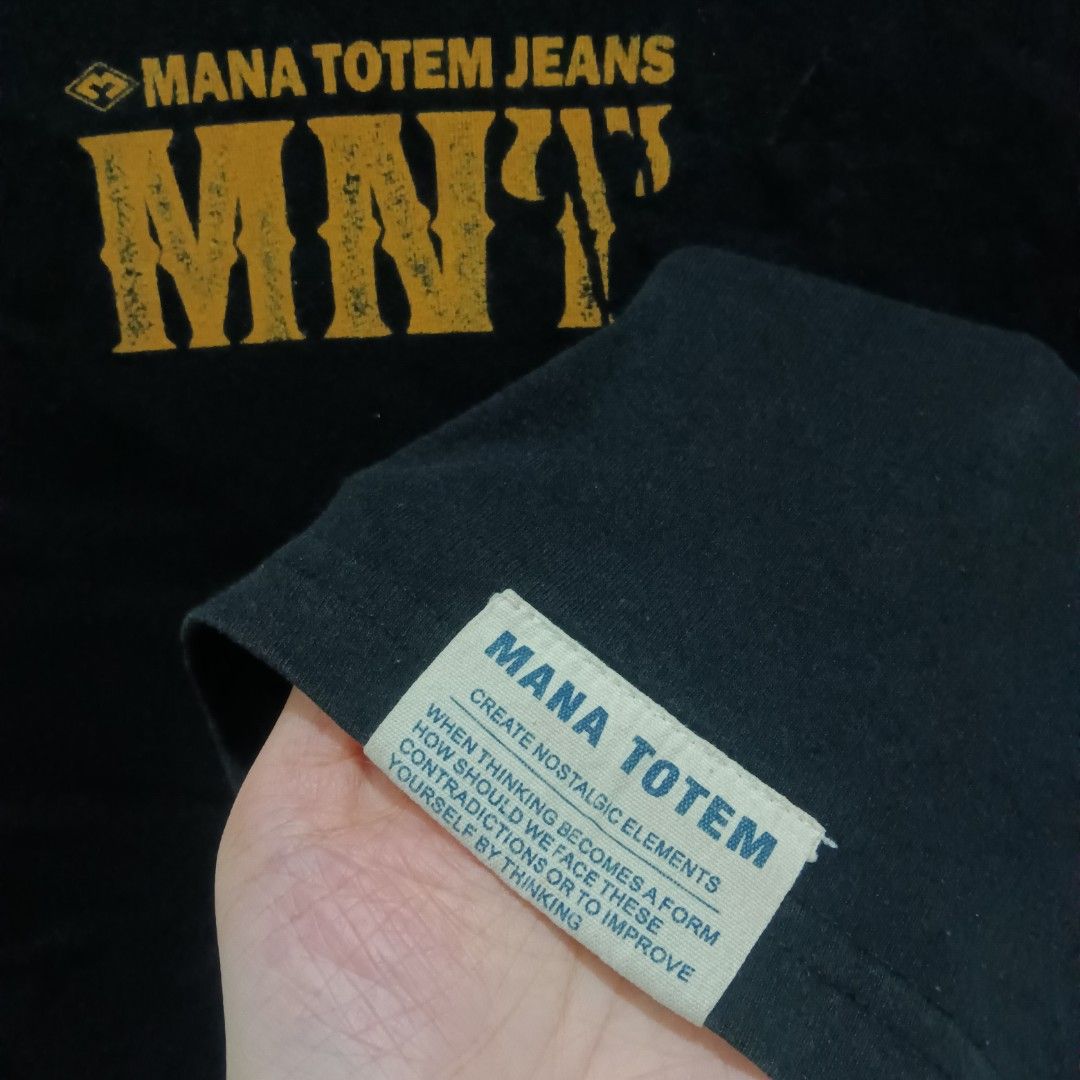 MANA TOTEM Shirt (Category: Tshirts & Polo Shirts ) located in Caloocan City. Submitted by jaychingsss (Listing ID 1467750788, Image 3). Description: Mana Totem Shirt - 100 22x28 Complete Tags Color Rate: 9/10 No issue NEED WASH.