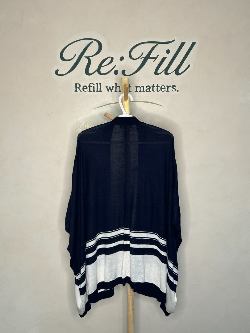 Mango Basics Navy Blue Cardigan One Size (Category: Coats, Jackets and Outerwear) located in Taguig. Submitted by re.wear.mnl (Listing ID 1467705223, Image 1). Description: - Brand: Mango Basics - Color: Navy blue with white and dark contrast stripes - Style: Open front draped cardigan - Fit: Relaxed, oversized, one-size-fits-all, Length: 28 inches - Perfect for: Easy layering and casual everyday outfits.