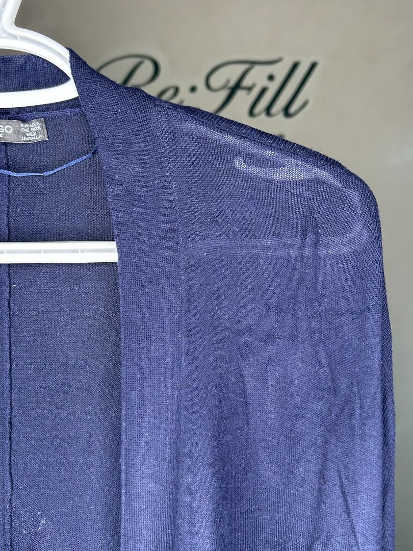 Mango Basics Navy Blue Cardigan One Size (Category: Coats, Jackets and Outerwear) located in Taguig. Submitted by re.wear.mnl (Listing ID 1467705223, Image 2). Description: - Brand: Mango Basics - Color: Navy blue with white and dark contrast stripes - Style: Open front draped cardigan - Fit: Relaxed, oversized, one-size-fits-all, Length: 28 inches - Perfect for: Easy layering and casual everyday outfits.