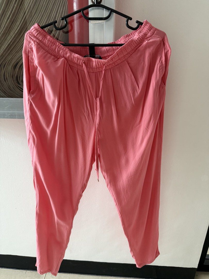 Mango Casual Pink Drawstring Pants Size S (Category: Other Bottoms) located in Mandaluyong City. Submitted by declutteringmylife101 (Listing ID 1467629994, Image 1). Description: - Brand: Mango - Size: S (USA 4 / EUR S) - Color: Pink - Fit: Relaxed and super comfortable - Waistband: Elastic with adjustable drawstring - Features: Soft lightweight fabric, pleated front details, and side pockets - Origin: Made in Bangladesh - Condition: Great for ca