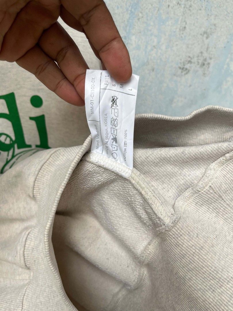 Mardi Mercredi (Category: Luxury Apparel) located in Siay. Submitted by Jaaziahthriftdumaguete (Listing ID 1467669091, Image 2). Description: Wts ❗ Mardi Mercredi Crewneck sweatshirt 24 width 25 length boxy fitting issue check picture yellow stain keo na magwash not visible naman when worn 9.5/10 color rate laser print Excellent condition overall Mine : 750 Free shipping fee Location Zamboanga Sibugay Mindanao.