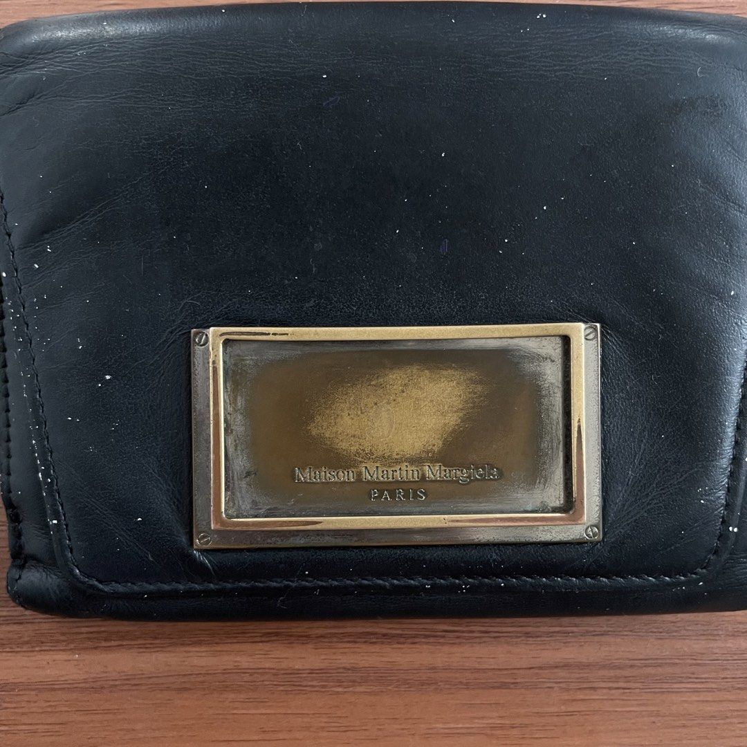 Margiela Wallet (Category: Wallets & Card Holders) located in Cabuyao City. Submitted by randomsell28 (Listing ID 1467655577, Image 2). Description: Authentic Margiela wallet Has paint transfer No major flaw P800 only.
