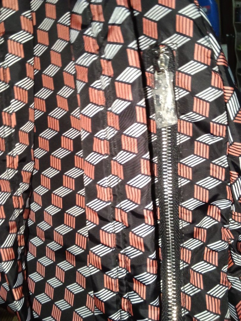 Mario By Mario Jacobus Geometric Pattern Backpack (Category: Backpacks) located in Nagcarlan. Submitted by irishcasta73122 (Listing ID 1467838543, Image 2). Description: from Japan inspired by marc Jacobs slightly negotiable never been use - Brand: Mario By Mario Jacobus Standard Supply (Type Workwear) - Design: Black with a bold red and white geometric cube pattern - Storage: Multiple exterior zippered compartments and an inner zippered pocket -