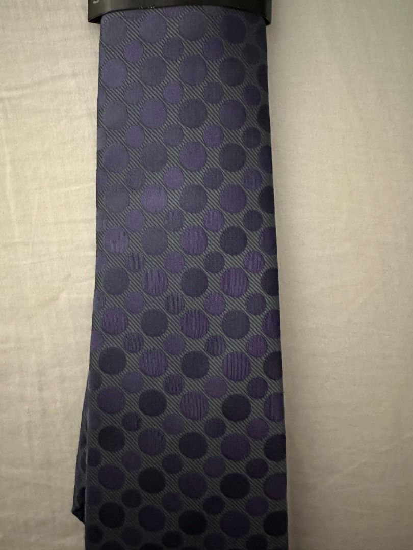 Marks & Spencer Tailoring Ultimate Machine Washable Tie (Category: Ties) located in San Juan City. Submitted by looneyc (Listing ID 1467627328, Image 1). Description: - Brand: Marks & Spencer - Design: Purple and blue tones with polka dot pattern - Width: Standard width necktie - Features: Machine washable with stain defence technology - Condition: Brand new with original paper band and plastic hanger tag attached - Ideal for: Work, office, or fo