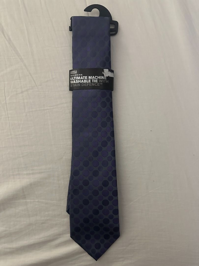 Marks & Spencer Tailoring Ultimate Machine Washable Tie (Category: Ties) located in San Juan City. Submitted by looneyc (Listing ID 1467627328, Image 3). Description: - Brand: Marks & Spencer - Design: Purple and blue tones with polka dot pattern - Width: Standard width necktie - Features: Machine washable with stain defence technology - Condition: Brand new with original paper band and plastic hanger tag attached - Ideal for: Work, office, or fo