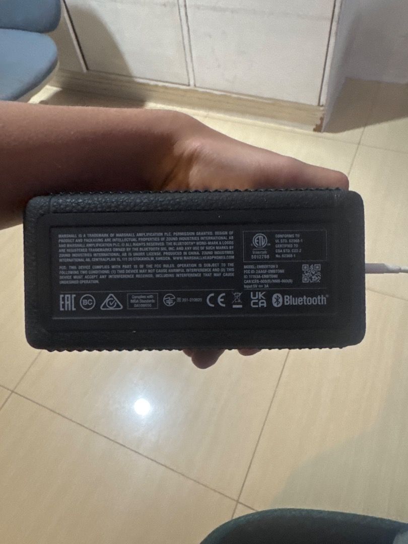 Marshall Emberton (Read Description) (Category: Soundbars, Speakers & Amplifiers) located in Caloocan City. Submitted by oddlion.899135 (Listing ID 1467477970, Image 3). Description: - Brand: Marshall - Color: Classic black - Sound Quality: Surprisingly powerful audio output for a small unit - Condition: Clean grille, no major scratches, and despite the issues sound quality is this good - RFS: Decluttering / upgrading gear - Issues: When on max v