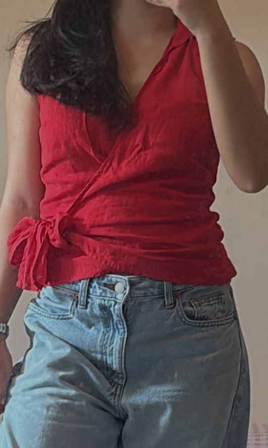 Massimo Dutti - Red Linen Wrap Top (Small) (Category: Sleeveless) located in Taguig. Submitted by solana36 (Listing ID 1467633998, Image 1). Description: - Brand: Massimo Dutti - Item: Sleeveless Wrap Top - Color: Red - Material: 100% Linen - Size: Fits up to small size - Details: Collared neckline, wrap front style with tie side.