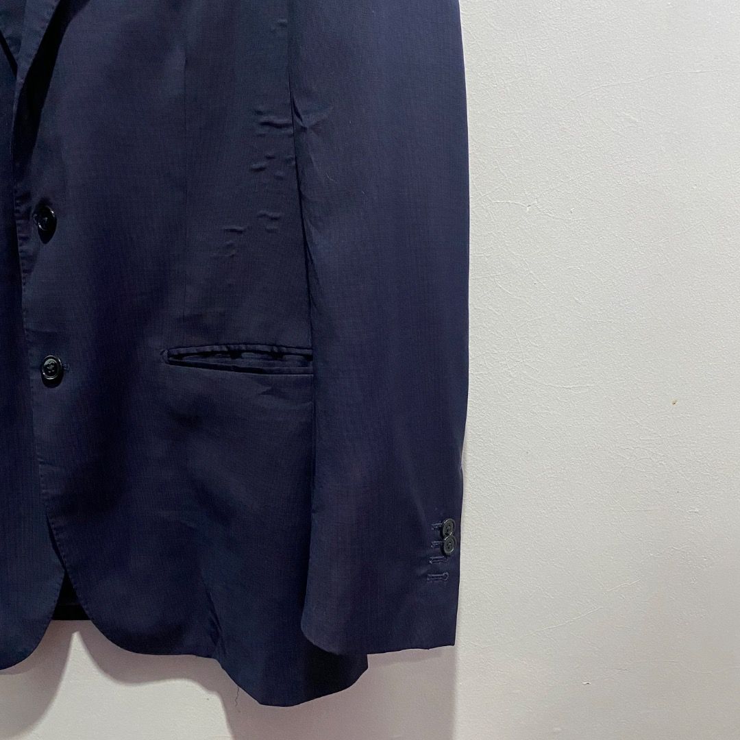 Massimo Dutti Extrafine Wool Jacket L (Category: Coats, Jackets and Outerwear) located in Antipolo. Submitted by bentakahitanoano (Listing ID 1467736790, Image 3). Description: This is a Massimo Dutti regular fit navy blue jacket crafted from high-quality extrafine wool. It features a classic two-button fastening, notch lapels, a left welt chest pocket, and side flap pockets. Still wearable Visible bubbling as seen on photo Regular fit Best fit L