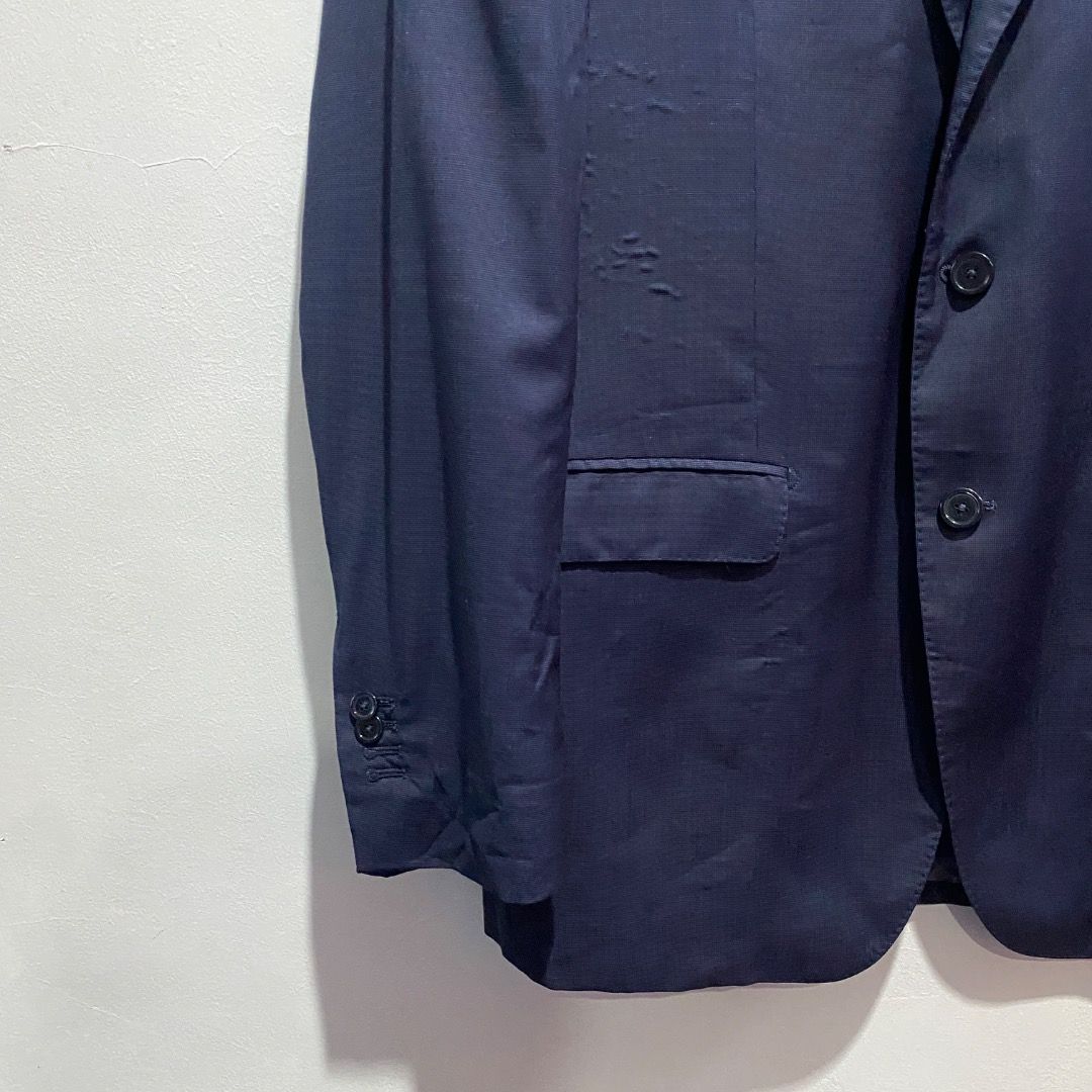 Massimo Dutti Extrafine Wool Jacket L (Category: Coats, Jackets and Outerwear) located in Antipolo. Submitted by bentakahitanoano (Listing ID 1467736790, Image 2). Description: This is a Massimo Dutti regular fit navy blue jacket crafted from high-quality extrafine wool. It features a classic two-button fastening, notch lapels, a left welt chest pocket, and side flap pockets. Still wearable Visible bubbling as seen on photo Regular fit Best fit L