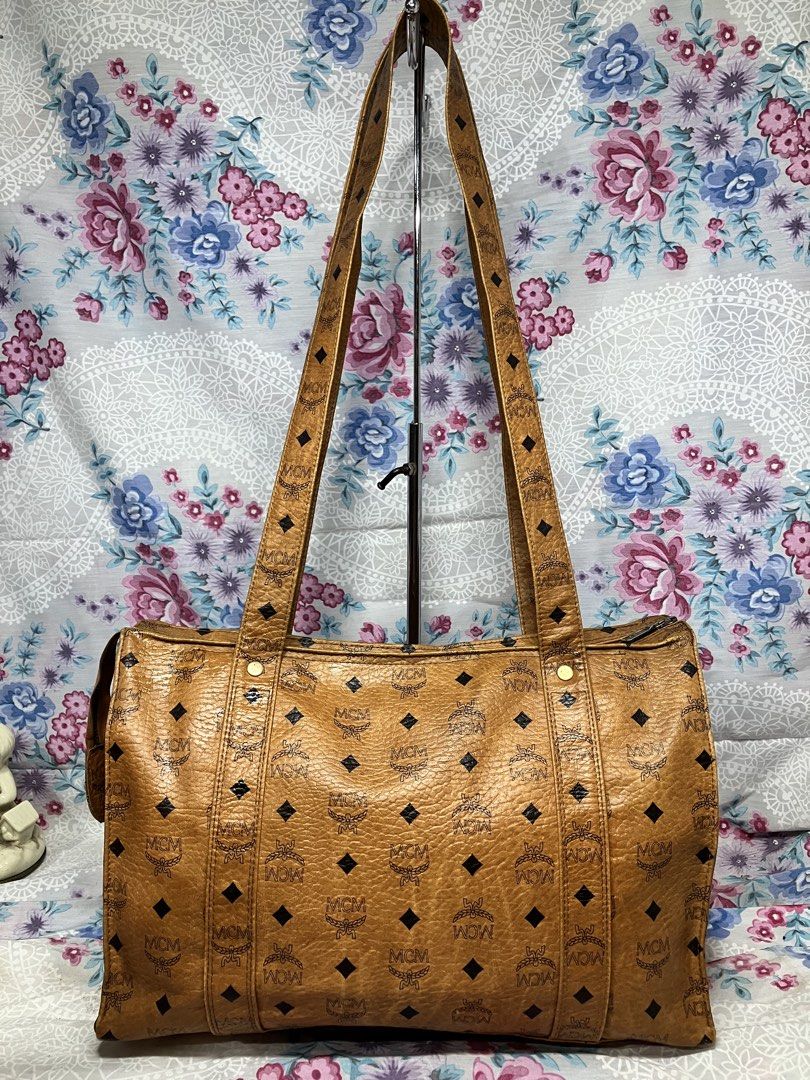 MCM COGNAC VISETOS COATED CANVAS SHOULDER BAG (Category: Tote Bags) located in General Mariano Alvarez. Submitted by adonid (Listing ID 1467646488, Image 3). Description: MCM COGNAC VISETOS COATED CANVAS SHOULDER BAG GOOD CONDITION NORMAL SIGN OF USAGE ONLY .