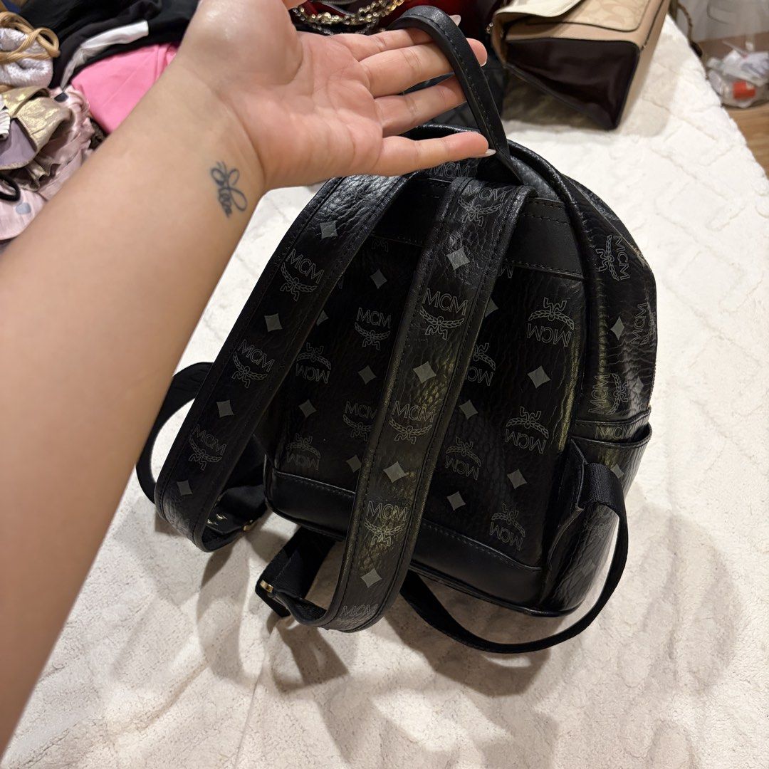 MCM Small Stark Studded Backpack (Category: Backpacks) located in Angeles City. Submitted by astravintage (Listing ID 1467811357, Image 3). Description: Like new super bigat, looks auth for me pero kayo nalang po patest, with code sa gold hardware sa harap. Issue is slight rubs sa baba check pics po .