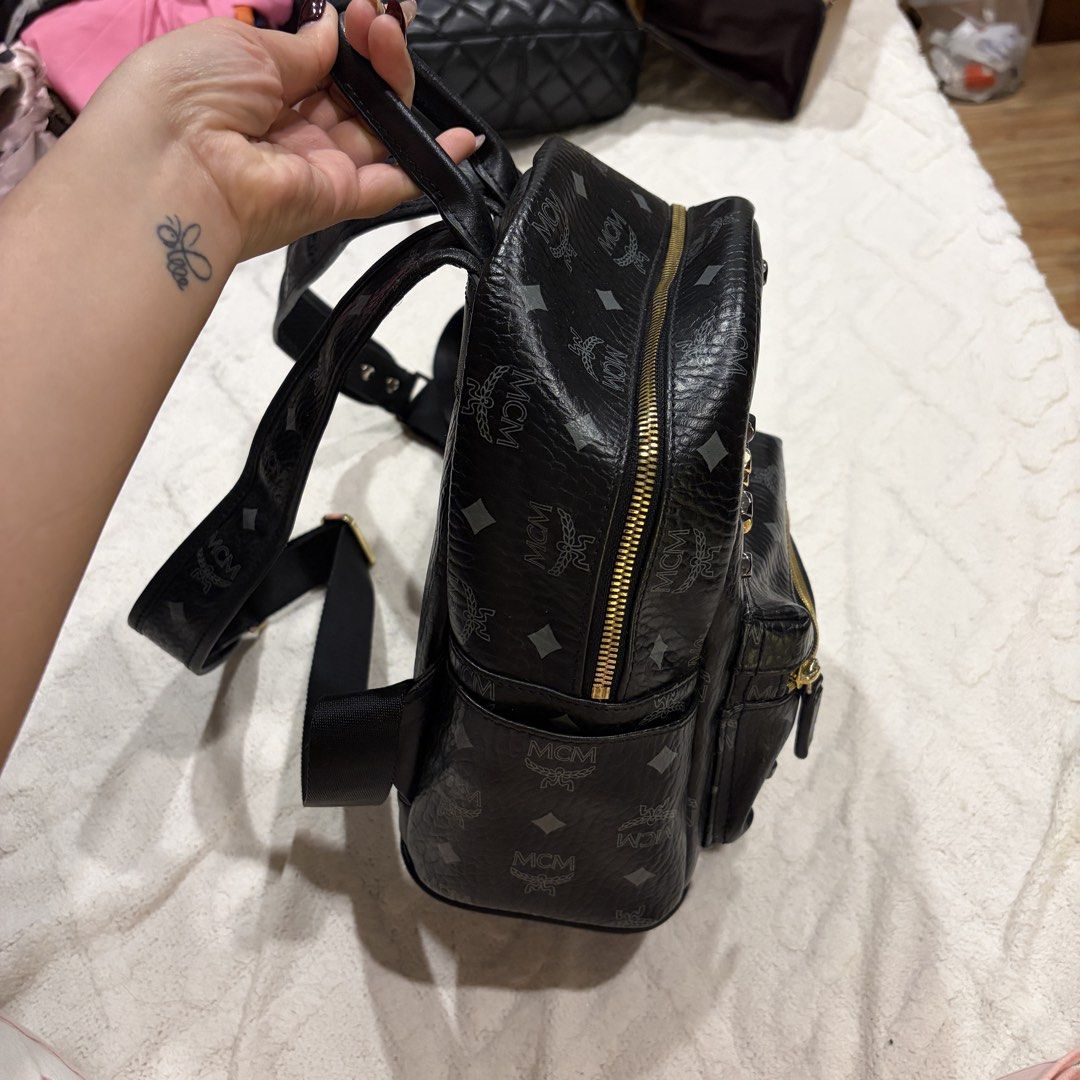 MCM Small Stark Studded Backpack (Category: Backpacks) located in Angeles City. Submitted by astravintage (Listing ID 1467811357, Image 2). Description: Like new super bigat, looks auth for me pero kayo nalang po patest, with code sa gold hardware sa harap. Issue is slight rubs sa baba check pics po .