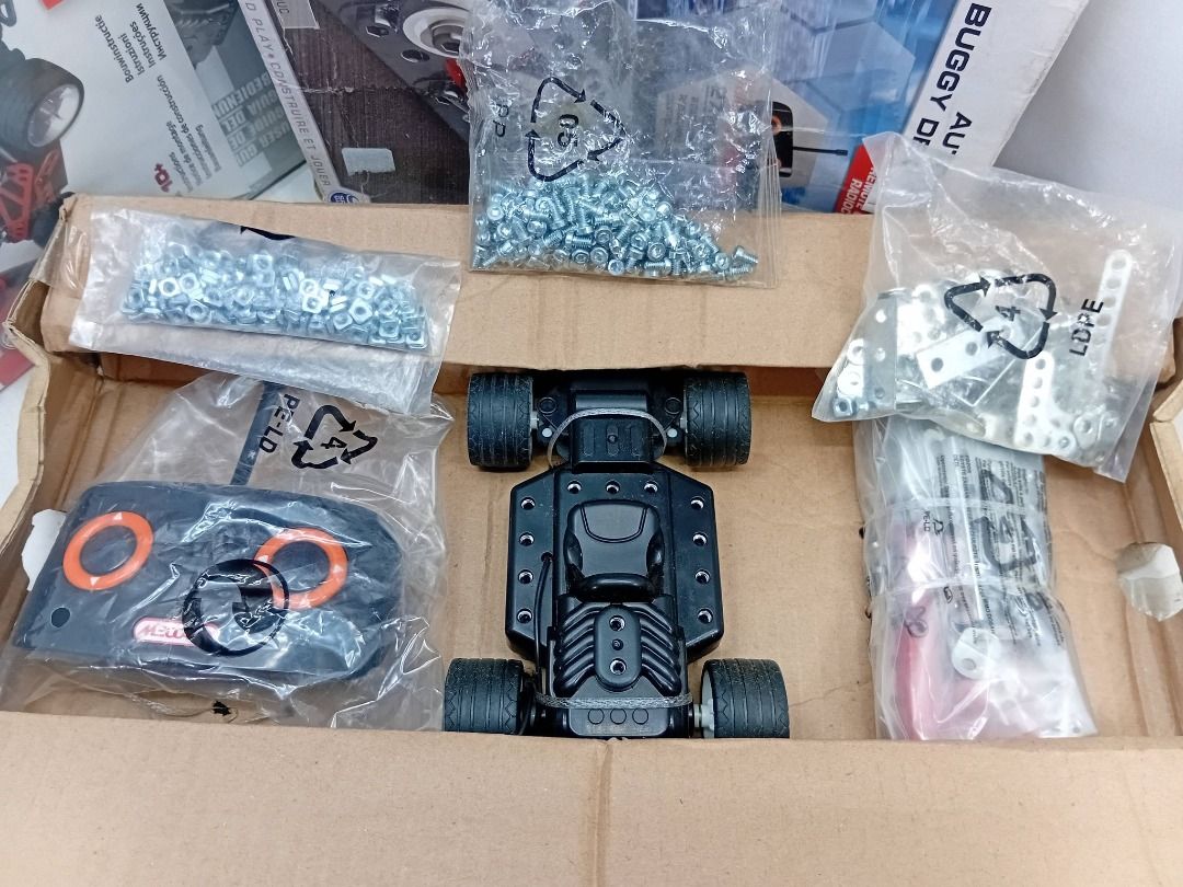 Meccano Maker System Autocross Spin Master R/C Buggy (Category: Remote Control Toys) located in Quezon City. Submitted by ToyzzKoleksyon (Listing ID 1467631777, Image 3). Description: Authentic/Branded. -Power Requirements: Requires 3 AA batteries for the vehicle and 1 PP3 (9V) battery for the remote control (not included) -Price: 700 -Condition: AS IS. New. OLD STOCK. -Issue: NOT TESTED -What you see is what you get. -Please check photos for iss