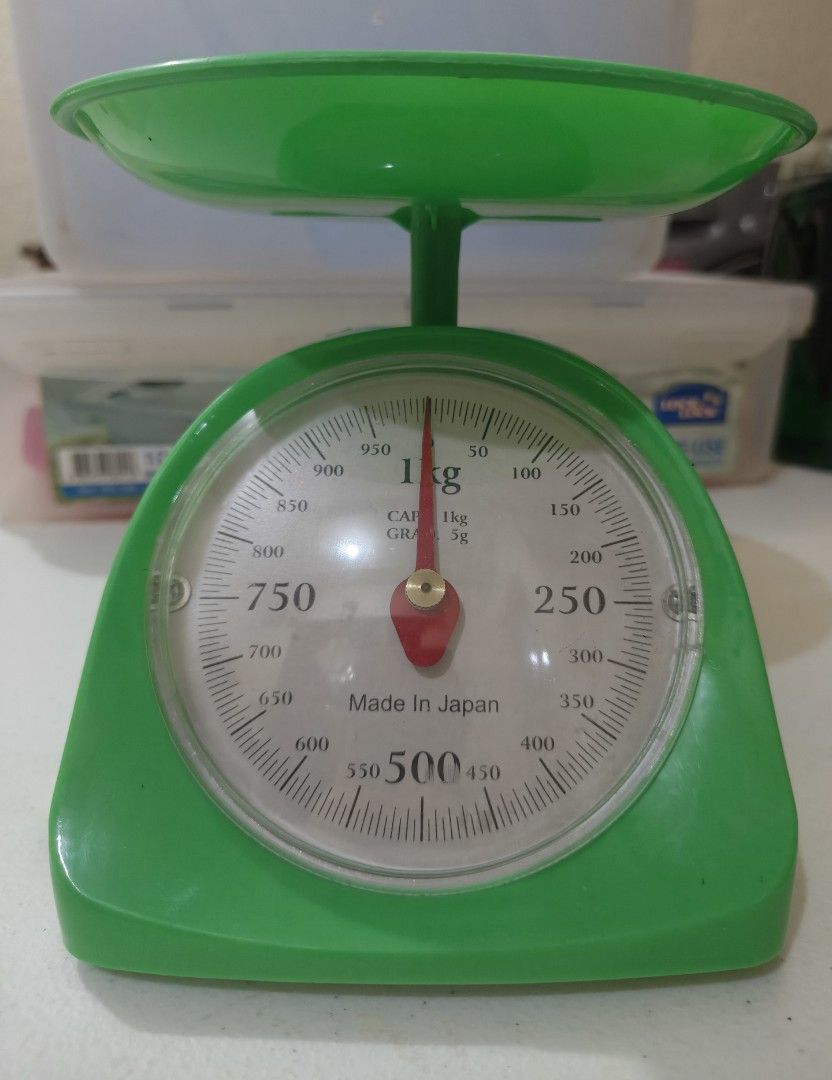 Mechanical Kitchen Weighing Scale (1kg) (Category: Cookware & Accessories) located in Las Pinas. Submitted by maryaaa___decluttering (Listing ID 1467651705, Image 1). Description: - Authentic Made in Japan mechanical kitchen scale - Vibrant retro green color with clear analog dial - Maximum capacity: 1kg with 5g graduation - Includes a removable top tray for hassle-free measuring - Compact size: stands roughly 16cm tall, great for small counterto