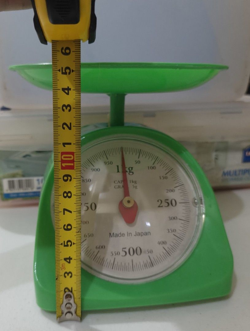Mechanical Kitchen Weighing Scale (1kg) (Category: Cookware & Accessories) located in Las Pinas. Submitted by maryaaa___decluttering (Listing ID 1467651705, Image 2). Description: - Authentic Made in Japan mechanical kitchen scale - Vibrant retro green color with clear analog dial - Maximum capacity: 1kg with 5g graduation - Includes a removable top tray for hassle-free measuring - Compact size: stands roughly 16cm tall, great for small counterto