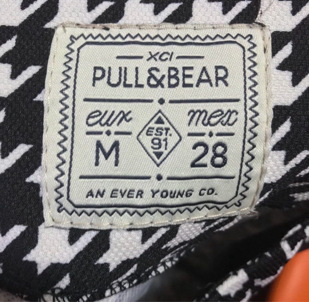 Medium Pull&Bear Houndstooth Top with Faux Leather Sleeves (Category: Blouses) located in Marikina City. Submitted by lovegoeson (Listing ID 1467608280, Image 3). Description: - Brand: Pull&Bear - Size: M (fits true to size) - Design: Classic black and white houndstooth body with long black faux leather sleeves - Neckline: Round neck - Fabric: Comfortable textured material - Styling: Easy to match with jeans or skirts for casual or edgy outfits -