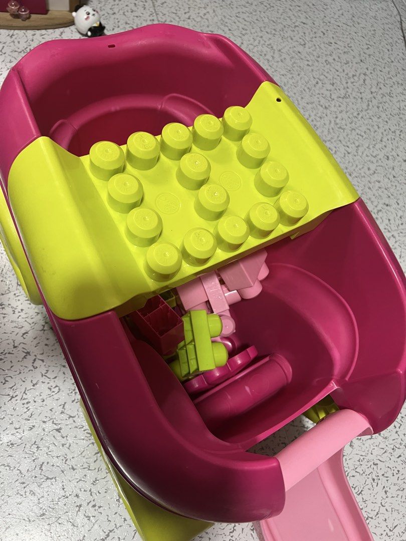 Mega Bloks First Builders Pink Toy Wagon with Blocks (Category: Kids Toys) located in Quezon City. Submitted by prelovedbyjmy (Listing ID 1467681457, Image 3). Description: - Mega Bloks push-and-pull toy wagon in fun pink and lime green colors - Features a built-in building plate right on the handle - Includes a spacious storage compartment filled with colorful blocks - Big chunky wheels make it easy for toddlers to roll around - Great for active