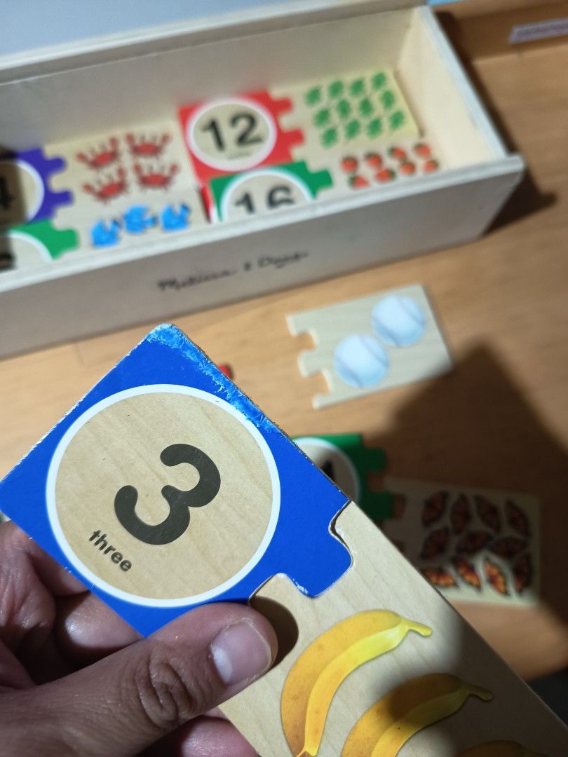 Melissa & Doug Self-Correcting Wooden Number Puzzles Set (Category: Educational & Learning Toys) located in Baguio. Submitted by lovedbyadelard (Listing ID 1467735670, Image 2). Description: Complete set and still in like-new condition. The only issue is with the number 3 piece; aside from that, everything is in great shape. My kids only really used numbers 1–5, and we ended up preferring number charts over puzzles, so this didn't get much use. �