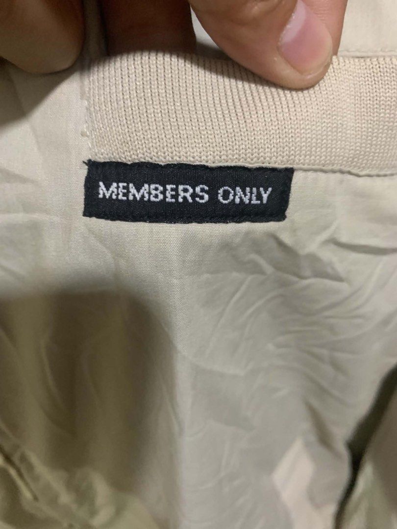 Members Only Vintage Beige Jacket Size M (Category: Coats, Jackets and Outerwear) located in Tagum. Submitted by knilevinc69480 (Listing ID 1467660708, Image 2). Description: - Brand: Members Only - Color: Beige - Size: Medium (M) - Style: Classic racer jacket with snap strap collar, front zipper, and chest pocket with signature label - Details: Knit ribbed cuffs and hem - Material: Cotton blend, machine washable - Condition: Clean, classic look 