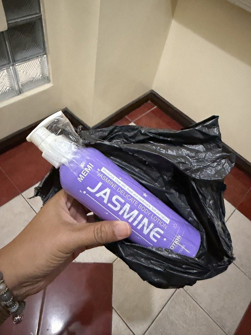 MEMI Jasmine Delicate Body Lotion 250ml (Category: Body Care) located in Manila. Submitted by declutterbaby28 (Listing ID 1467772617, Image 1). Description: - Brand: MEMI Jasmine Delicate Body Lotion - Size: 250ml purple pump bottle - Condition: Brand new, unused, still wrapped in plastic - Benefits: Deeply moisturizing formula for clear, fresh, and soft skin with all-day hydration - Scent: Smells amazing - Reason for selling: Decluttering extra 