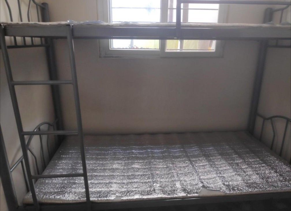 Metal Bunk Bed Frame with Ladder (Category: Bed Frames & Mattresses) located in Manila. Submitted by andrewolx (Listing ID 1467617305, Image 2). Description: IN EXCELLENT CONDITION BETTER QUALITY (Thicker Metal Tubes) THAN OTHER FRAMES COMPARABLE IN PRICE (4.5k range) 9/10 External and Internal Condition No paint peeling No rust Dimensions 79 × 38 × 61 INCHES 79 inches length 38 inches width 61 inches height PICKUP ONLY (Item is in Metro Manila, 
