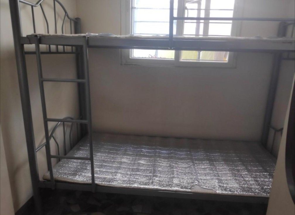 Metal Bunk Bed Frame with Ladder (Category: Bed Frames & Mattresses) located in Manila. Submitted by andrewolx (Listing ID 1467617305, Image 1). Description: IN EXCELLENT CONDITION BETTER QUALITY (Thicker Metal Tubes) THAN OTHER FRAMES COMPARABLE IN PRICE (4.5k range) 9/10 External and Internal Condition No paint peeling No rust Dimensions 79 × 38 × 61 INCHES 79 inches length 38 inches width 61 inches height PICKUP ONLY (Item is in Metro Manila, 