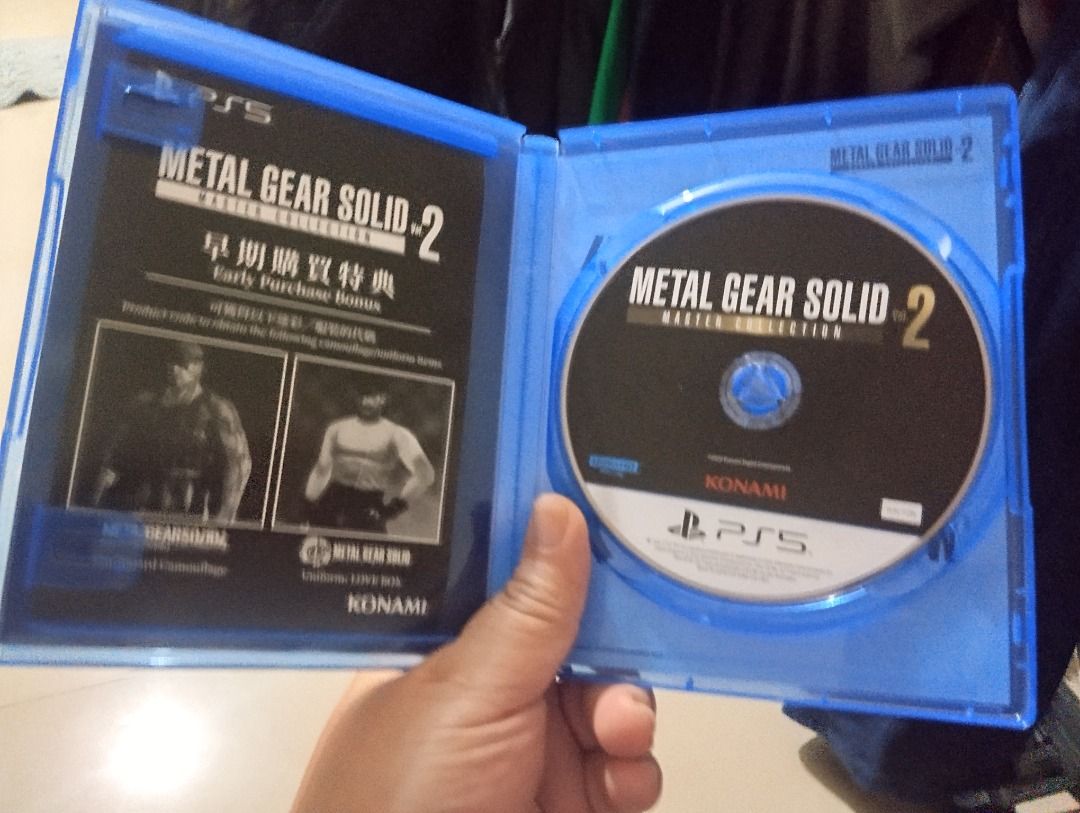 Metal Gear Solid Master Collection Vol. 2 PS5 (Category: PlayStation) located in Manila. Submitted by hikari9 (Listing ID 1467622622, Image 3). Description: - Platform: PlayStation 5 (Standard Blue Case) - Title: Metal Gear Solid Master Collection Vol. 2 - Featured Games: Metal Gear Solid 4: Guns of the Patriots, Peace Walker, and more - Language: Supports both Japanese and English - Condition: Physical disc and case on hand - Extras: Unused earl