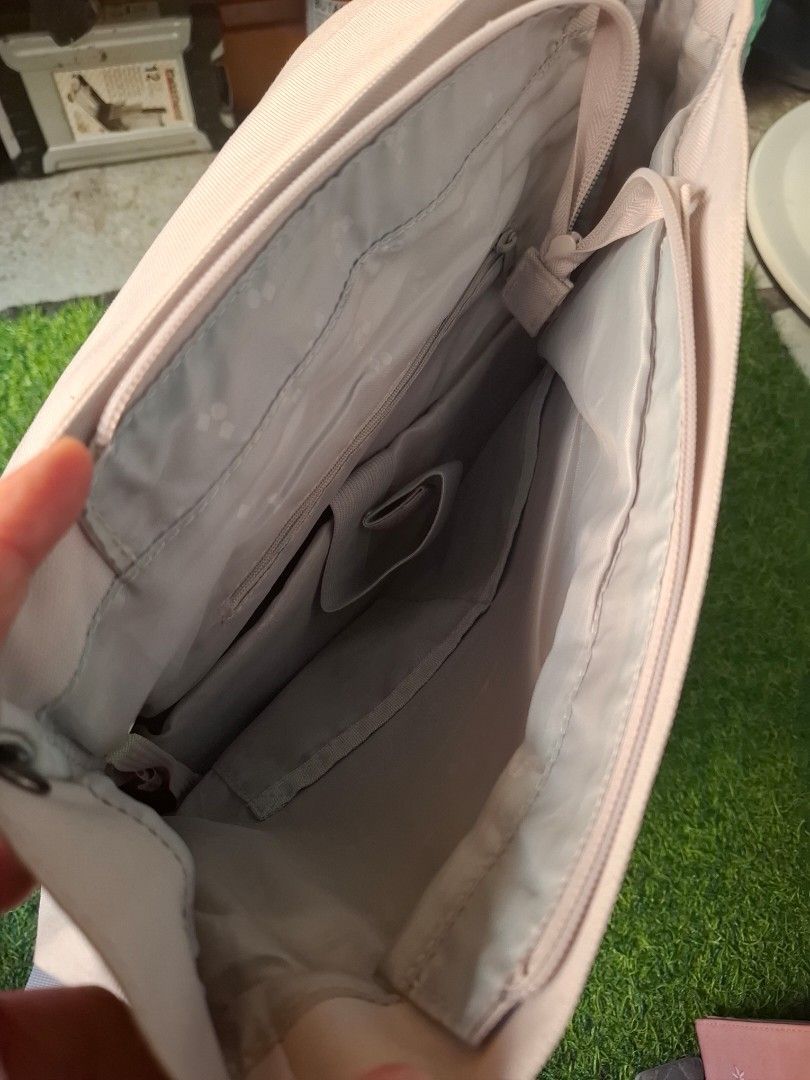 MHL. backpack grey/lavender (Category: Backpacks) located in Pasay City. Submitted by emilia1102 (Listing ID 1467787662, Image 3). Description: - Brand: MHL - Material: Durable grey canvas - Design: Foldover front flap with snap closure and subtle brand logo - Comfort: Padded shoulder straps with adjustable sliders - Storage: Horizontal zipper pocket on the back panel for quick access - Price: Grab it now for only ₱500 (Original retail: ₱1,386) -