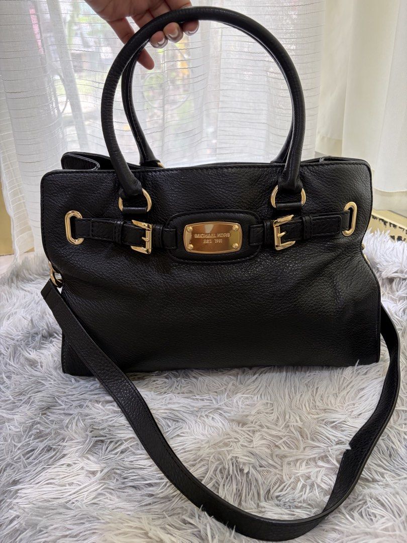 Michael Kors Buckle Bag (Category: Shoulder Bags) located in Manila. Submitted by abbey29 (Listing ID 1467622387, Image 1). Description: Slightly used but good as new. No scratches or leather peeling. All zippers are working. You can ask me for additional photos if needed..