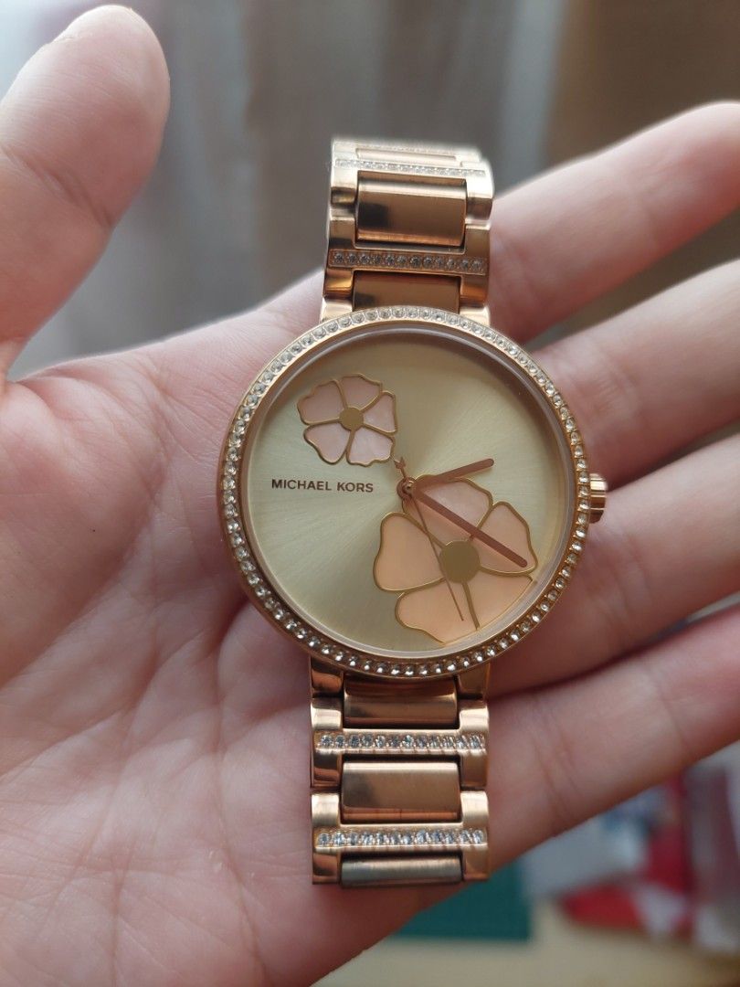 Michael Kors Courtney MK3836 (Category: Women's Watches) located in Malabon City. Submitted by minsanasana (Listing ID 1467629015, Image 2). Description: - Authentic Rose Gold Michael Kors Watch - Round dial with delicate pink flower details - Sparkling crystal bezel and crystal rows on the bracelet links - Color: Rose Gold - Condition: Excellent / Gorgeous piece that catches the light - Inclusions: Original box, paper booklet Just needs battery 