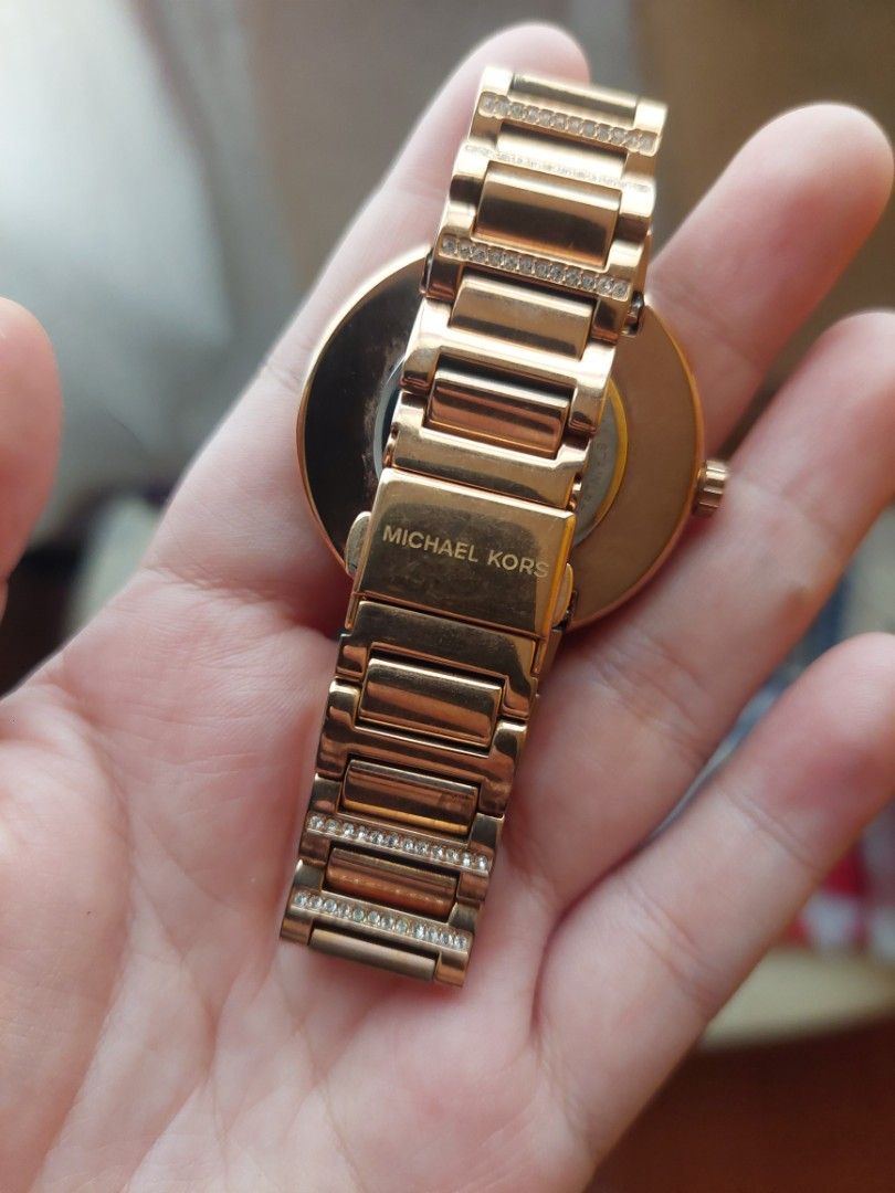 Michael Kors Courtney MK3836 (Category: Women's Watches) located in Malabon City. Submitted by minsanasana (Listing ID 1467629015, Image 3). Description: - Authentic Rose Gold Michael Kors Watch - Round dial with delicate pink flower details - Sparkling crystal bezel and crystal rows on the bracelet links - Color: Rose Gold - Condition: Excellent / Gorgeous piece that catches the light - Inclusions: Original box, paper booklet Just needs battery 