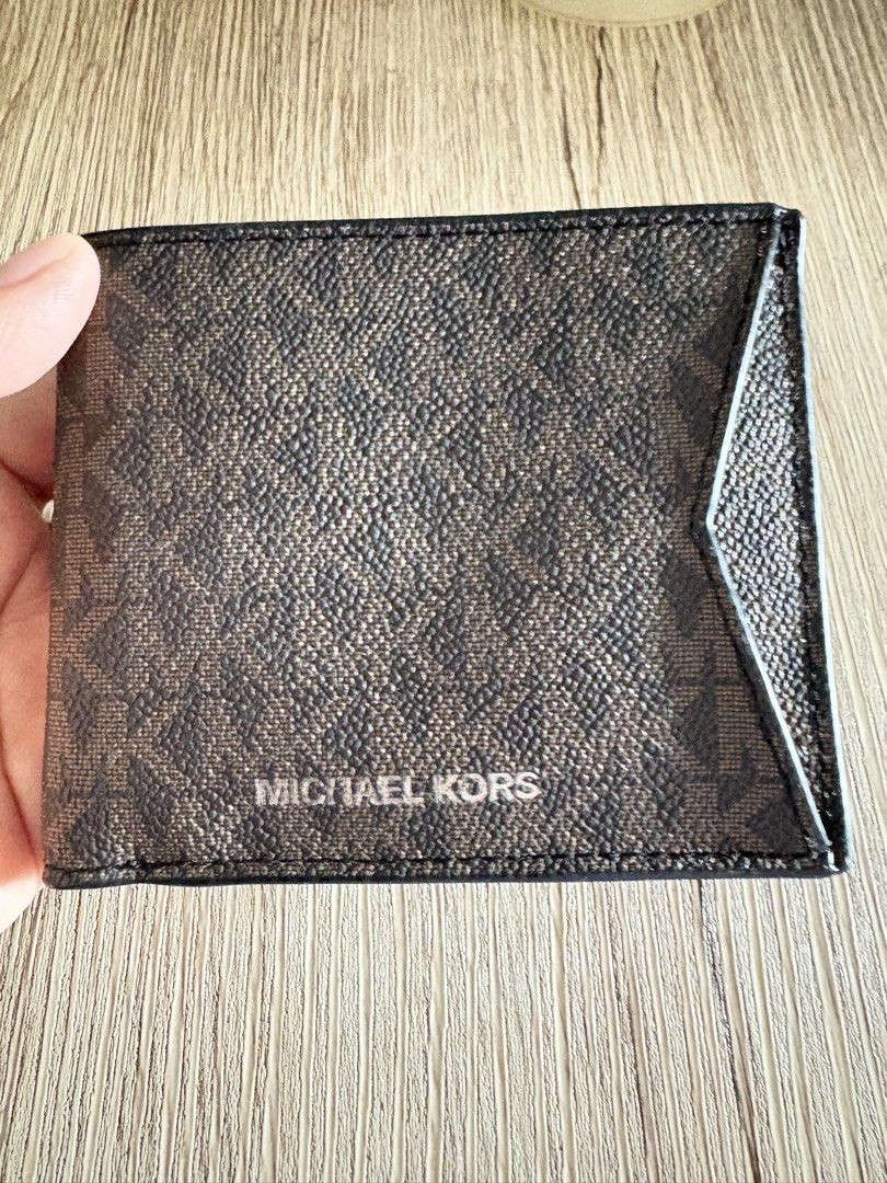Michael Kors Men’s Bifold Wallet | Imported (Category: Wallets & Card Holders) located in Taguig. Submitted by blissdreana (Listing ID 1467676359, Image 3). Description: Brand new with tag Imported from 🇺🇸 Bifold Brown/monogram Has multiple card slots Bill compartment.