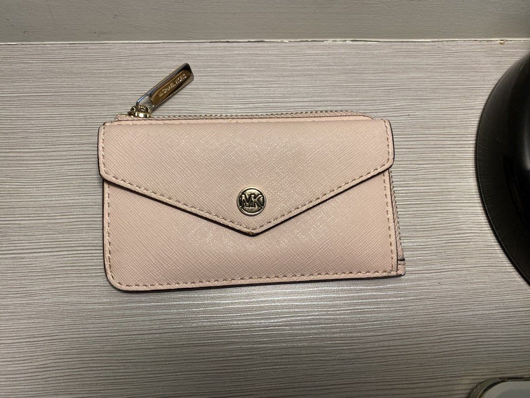 Michael Kors Coin Pouch Card Holder (Category: Luxury Bags & Wallets) located in Paranaque City. Submitted by declutterbykat (Listing ID 1467734031, Image 1). Description: ‼️ slight leather chipping on the edge of the front envelope flap. see last photo. 🔖 rfs: decluttering 📍 parañaque city 💸 mop: gcash or maya only 🚖 mod: lalamove, grab, or jnt .
