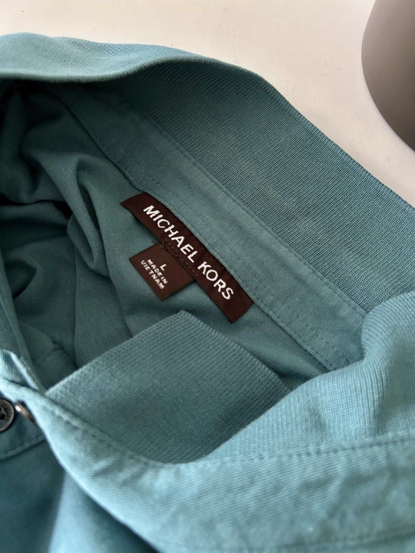 Michael Kors Polo Shirt (Category: Tshirts & Polo Shirts ) located in Cainta. Submitted by mimidiva (Listing ID 1467746104, Image 2). Description: Michael Kors Polo Shirt Color - Teal Blue Size - Large Cainta Location .